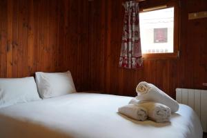 Postel nebo postele na pokoji v ubytování Appartement Ski au pied - Courchevel La Tania