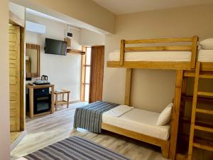 Кровать или кровати в номере Bodrum Konağı