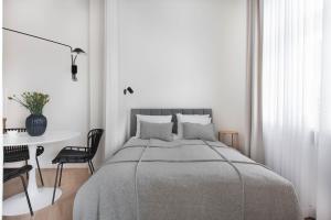 Posteľ alebo postele v izbe v ubytovaní Apartament Kazimierz Mostowa