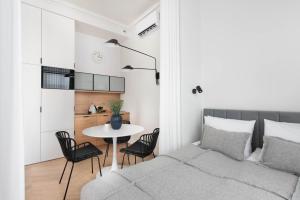 Posteľ alebo postele v izbe v ubytovaní Apartament Kazimierz Mostowa