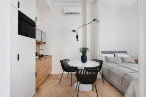 Televízia a/alebo spoločenská miestnosť v ubytovaní Apartament Kazimierz Mostowa