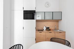 Kuchyňa alebo kuchynka v ubytovaní Apartament Kazimierz Mostowa