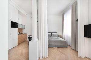 Posteľ alebo postele v izbe v ubytovaní Apartament Kazimierz Mostowa