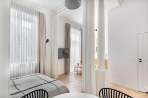Televízia a/alebo spoločenská miestnosť v ubytovaní Apartament Kazimierz Mostowa