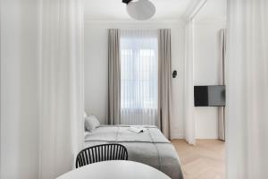 Posteľ alebo postele v izbe v ubytovaní Apartament Kazimierz Mostowa