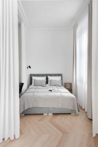 Posteľ alebo postele v izbe v ubytovaní Apartament Kazimierz Mostowa