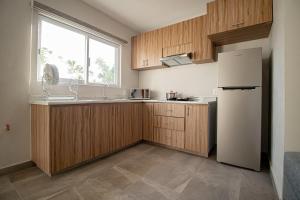 Dapur atau dapur kecil di Memora Hotel & Villas Chapala