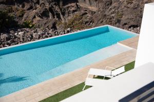 Bazén v ubytovaní KARAT Villa Playa Paraiso alebo v jeho blízkosti