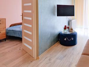 Posteľ alebo postele v izbe v ubytovaní Baltic Edge Apartments