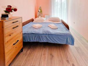 Posteľ alebo postele v izbe v ubytovaní Baltic Edge Apartments