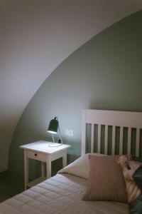 Postel nebo postele na pokoji v ubytování Residenza Delle Sirene