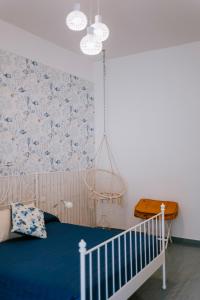 Postel nebo postele na pokoji v ubytování Residenza Delle Sirene