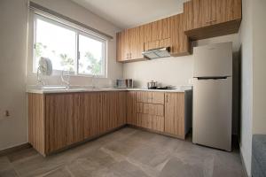 Dapur atau dapur kecil di Memora Hotel & Villas Chapala
