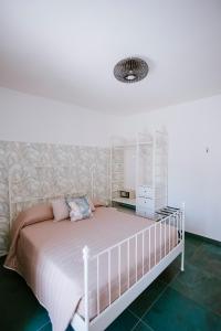 Postel nebo postele na pokoji v ubytování Residenza Delle Sirene