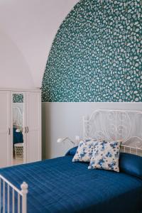 Postel nebo postele na pokoji v ubytování Residenza Delle Sirene