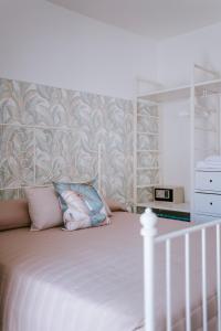 Postel nebo postele na pokoji v ubytování Residenza Delle Sirene