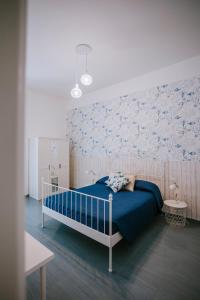 Postel nebo postele na pokoji v ubytování Residenza Delle Sirene