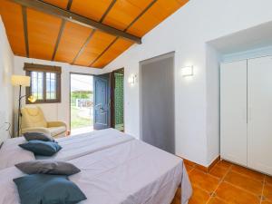 Postel nebo postele na pokoji v ubytování Cubo's Casita Rural Haro