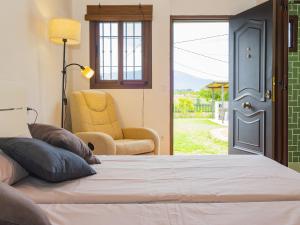 Postel nebo postele na pokoji v ubytování Cubo's Casita Rural Haro