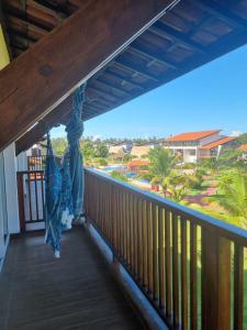 ein Balkon mit Blick auf das Meer in der Unterkunft Club Meridional Carneiros in Tamandaré
