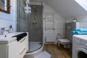 Kúpeľňa v ubytovaní Apartamenty na Piątkę