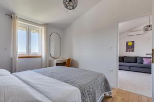 Posteľ alebo postele v izbe v ubytovaní Apartments Bonex