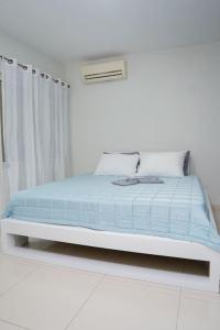 Katil atau katil-katil dalam bilik di Nice And Modern with king size bed