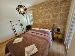 Postel nebo postele na pokoji v ubytování Villa GAJ