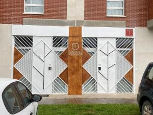 a mural on the side of a building at Coniferas in Santander