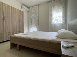 Postel nebo postele na pokoji v ubytování FLORIDA Apartments