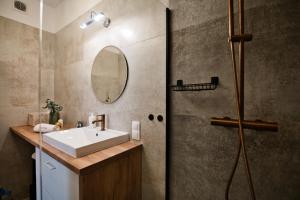 a bathroom with a sink and a shower at Pankrac 2 by Housine in Zator +34 photos