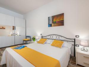 Un pat sau paturi într-o cameră la Casa con ampio cortile