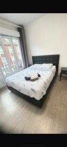 Postel nebo postele na pokoji v ubytování Chambre double
