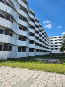 ミュンヘンにあるMyRoom - Munich Fair Apartmentsのアパートメントビルの外側の景色