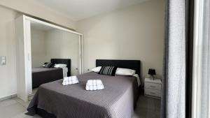 Giường trong phòng chung tại La vie en Abela