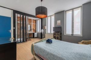 Postel nebo postele na pokoji v ubytování Douai house