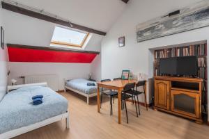 Postel nebo postele na pokoji v ubytování Douai house