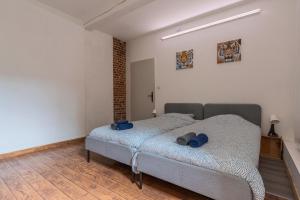 Postel nebo postele na pokoji v ubytování Douai house