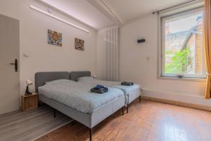 Postel nebo postele na pokoji v ubytování Douai house
