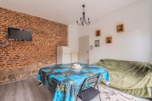 TV a/nebo společenská místnost v ubytování Douai house