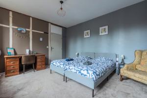 Postel nebo postele na pokoji v ubytování Douai house