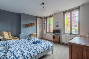 Postel nebo postele na pokoji v ubytování Douai house