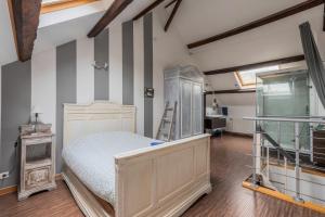 Postel nebo postele na pokoji v ubytování Douai house