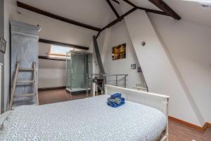 Postel nebo postele na pokoji v ubytování Douai house