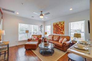 a living room with a couch and a table at Pet-Friendly Houston Apartment 1 Mi to Downtown! in Houston