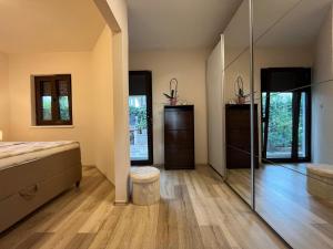 Postel nebo postele na pokoji v ubytování Apartments Deak