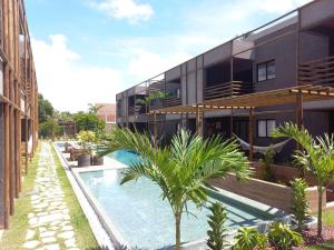 A piscina localizada em Villa Kamby Acomodações Rota dos Milagres ou nos arredores