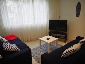 Telewizja i/lub zestaw kina domowego w obiekcie Apartamento marinero