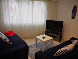 Telewizja i/lub zestaw kina domowego w obiekcie Apartamento marinero
