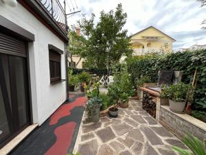 Zahrada ubytování Apartments Deak